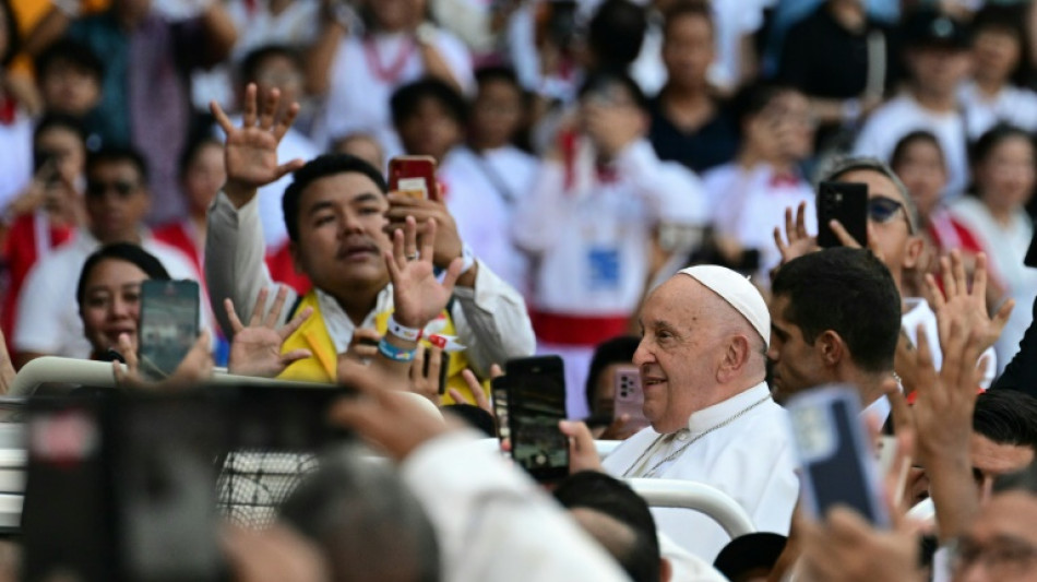 Pope appeals for religious unity at stadium mass in Indonesia