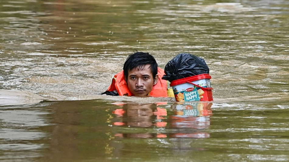 Vietnam typhoon victims plead for help as toll climbs to 82