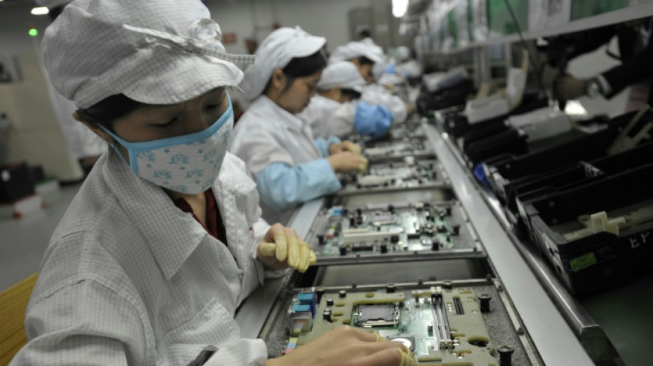 Beschäftigte von iPhone-Hersteller Foxconn in China gehen auf die Straße 