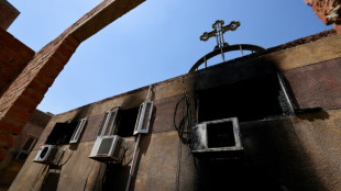 Egyptians mourn 41 killed in Cairo Coptic church fire