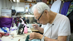 Hong Kong cheongsam master in the mood to retire after 75 years