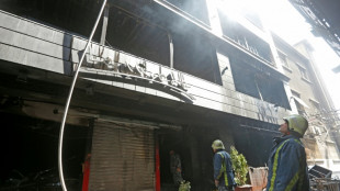 Eleven killed as fire rips through Syria shopping mall