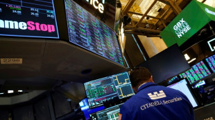 Wall Street clôt en hausse, encouragée par la Fed