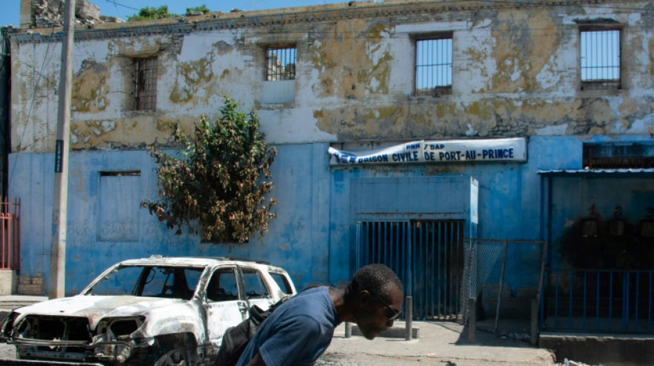 Chaos grips Haiti as PM struggles to return