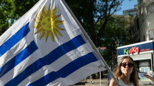 Uruguayans vote in tight race for president