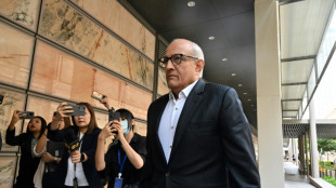 Singapore ex-minister pleads guilty in rare graft trial