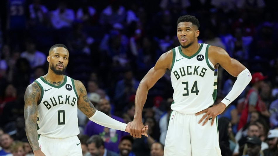 Bucks cruise past depleted Sixers to open NBA campaign