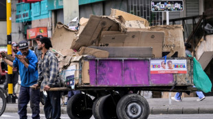 Colombians vote in high stakes presidential runoff 