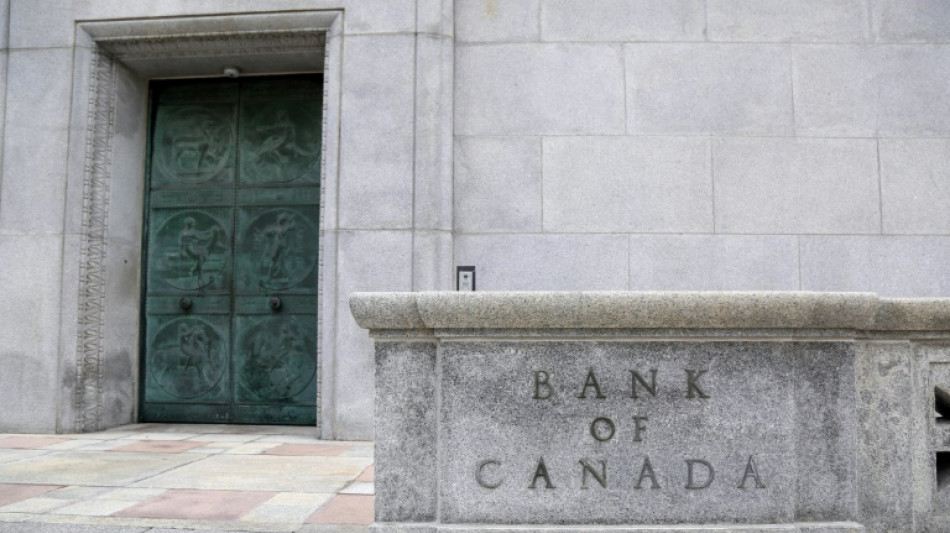 Canada central bank makes half point rate cut to 3.25%