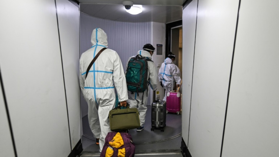 Jubilant Chinese plan trips abroad with Covid quarantines to end