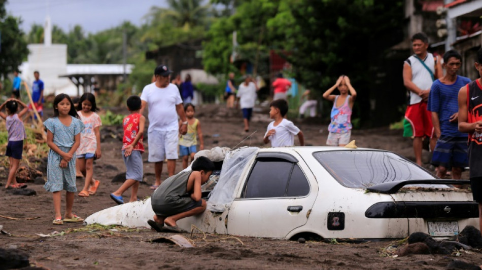 Seven dead, thousands evacuated as tropical storm batters Philippines