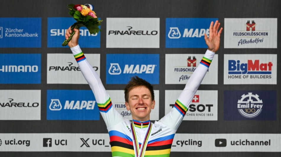 In dank Tour of Emilia, Pogacar shines in rainbow jersey