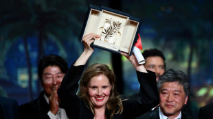 Justine Triet: French director takes top prize at Cannes