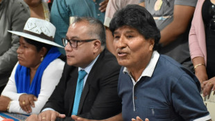 Ex-president of Bolivia says 14 shots fired at his car 