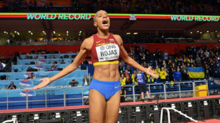 Record-setter Rojas nails third world indoor title