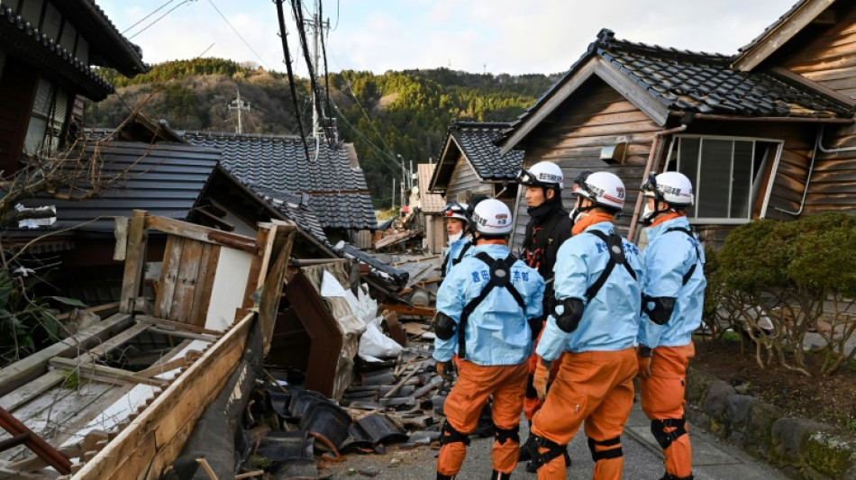 Japan quake toll rises to 64 as weather hampers rescuers