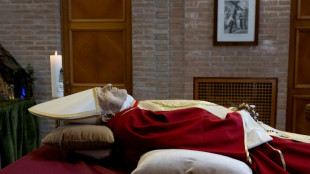 Pope hails 'beloved' Benedict as Vatican releases photos of body