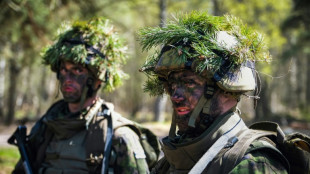 Rattled by Russia, Finns flock to military training