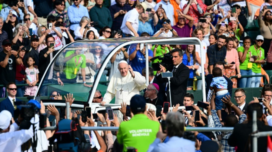 Pope leads open-air mass for thousands in Canada